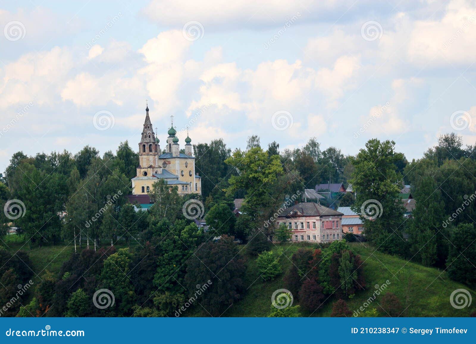 clouds over the river volga in old russian town tutayev