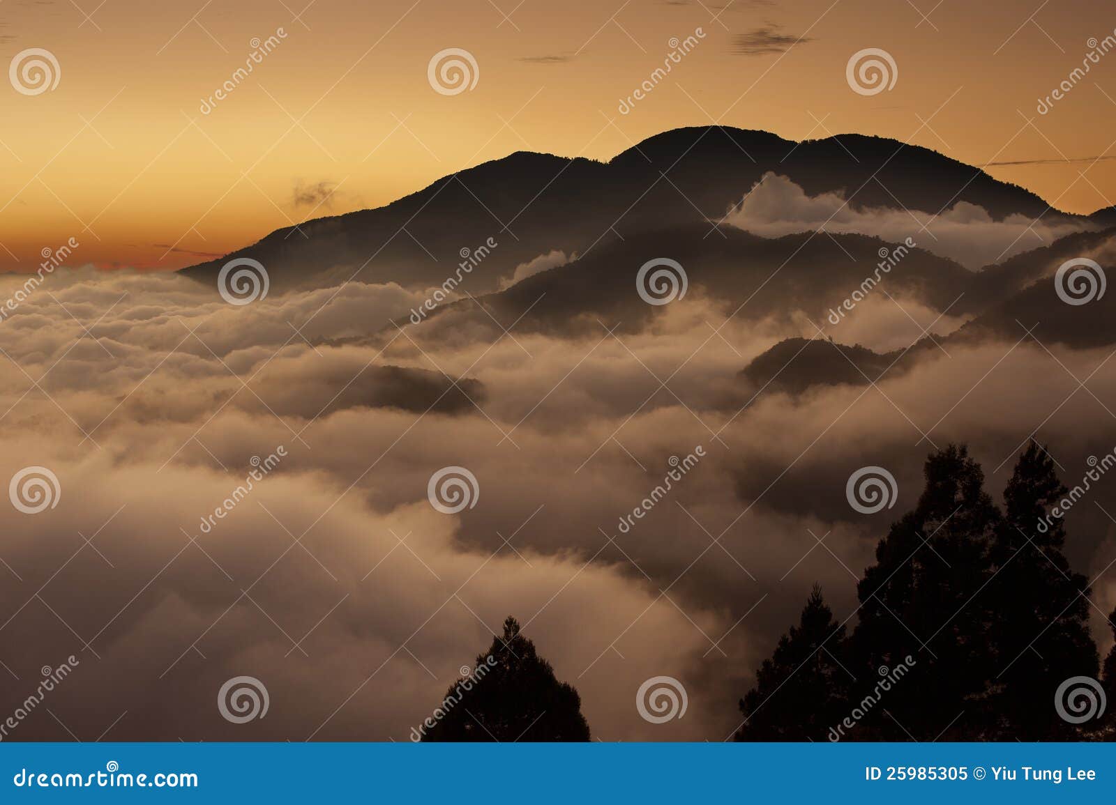 Beautiful view above cloudscape and mountains at dusk
