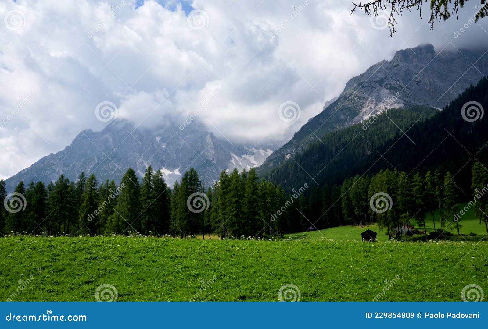 cloudy sky over the meadows of the val fiscalina