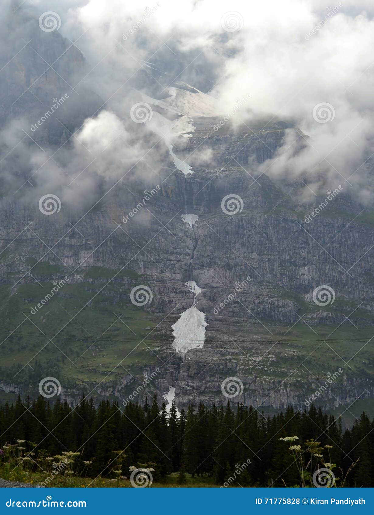 Cloudy Ice fall mountain stock photo. Image of contrasting 71775828