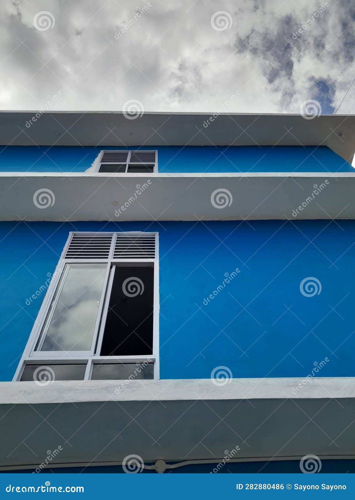 Cloudy Sky Conditions Seen from Below the 3storey Apartment Building Stock Photo Image of