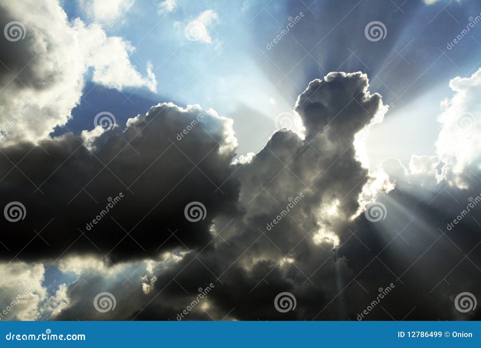 cloudy sky with sunrays