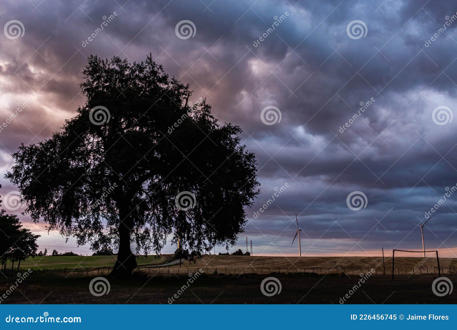 a cloudy sunset in the countryside