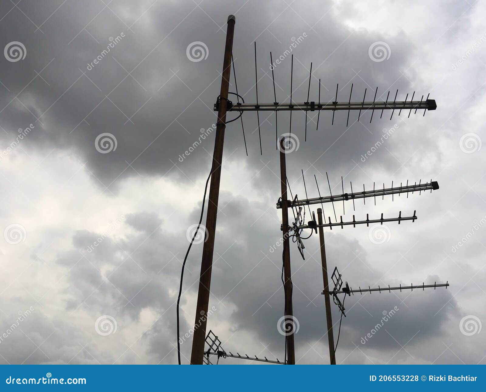 Three Antenna and cloudy stock photo. Image of three 206553228