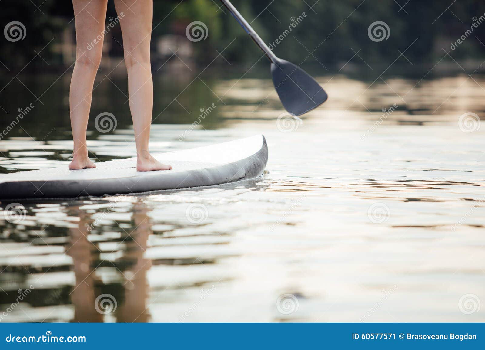 Clouse-up of a Woman Legs on Paddleboard Stock Image - Image of ...