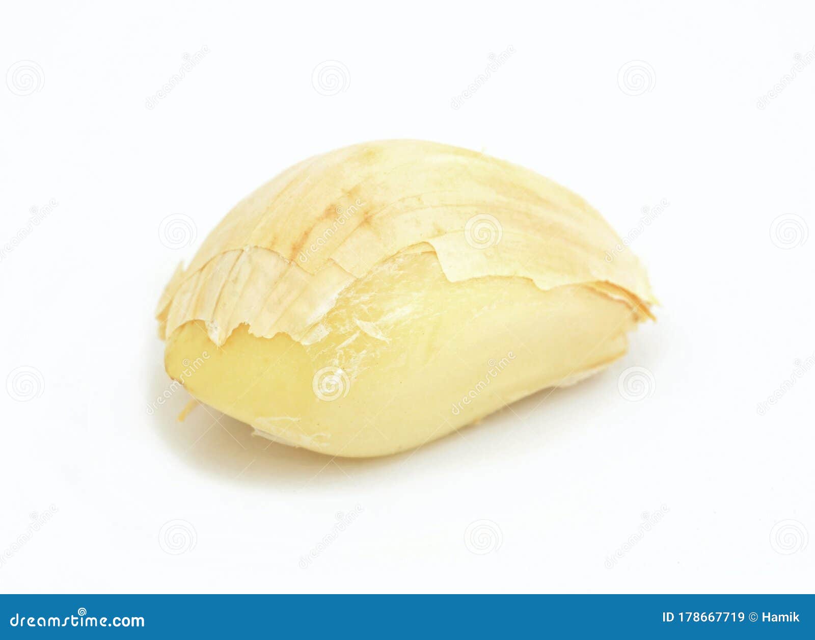 Clove Of Garlic On A Brown Wood Texture Stock Image 185239273