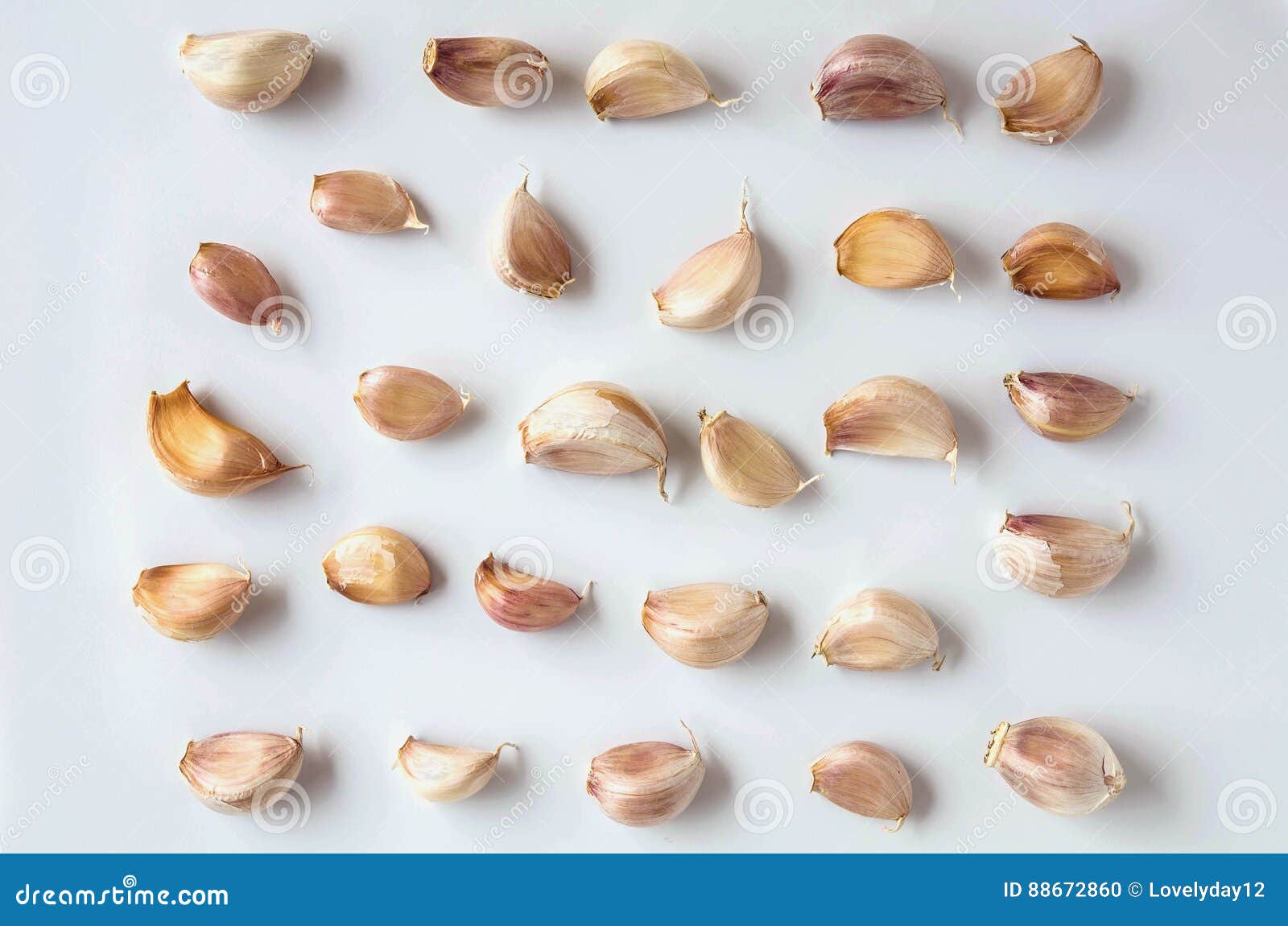 Clove Of Garlic On A Brown Wood Texture Stock Image 185239273