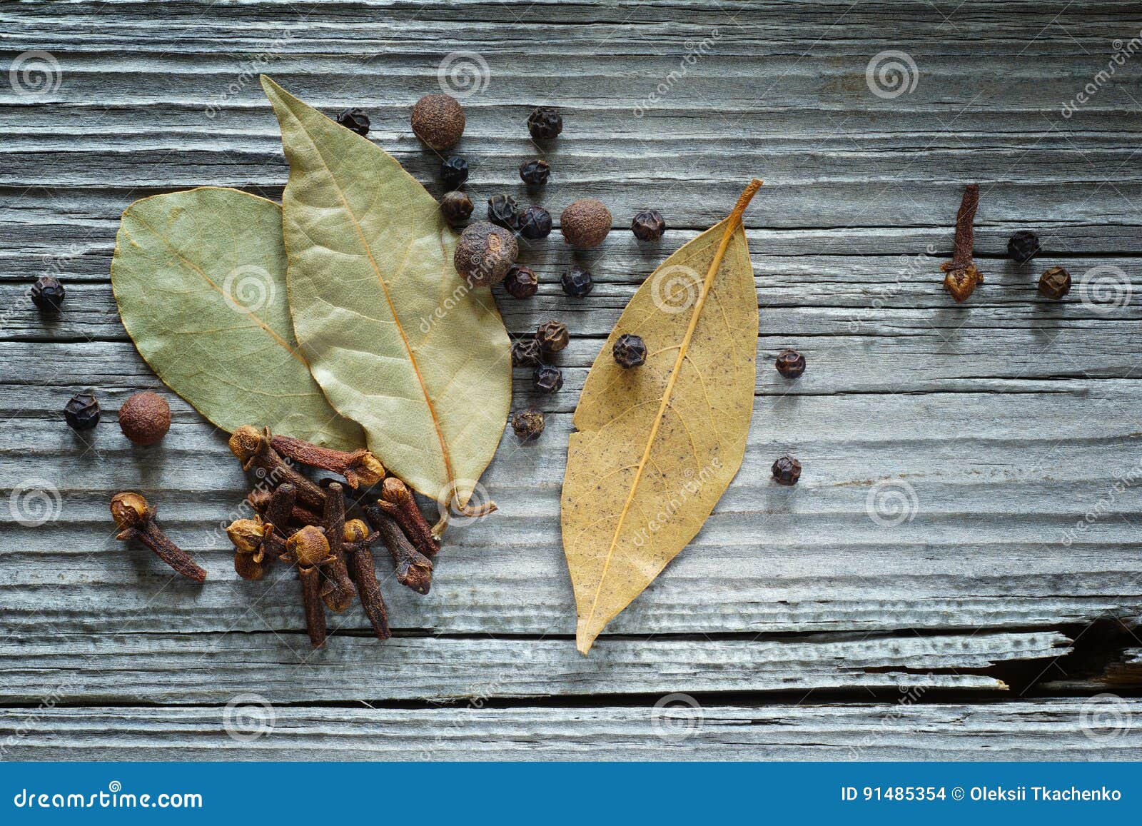 Cloves, Pepper and Bay Leaf on the Old Board Stock Photo Image of