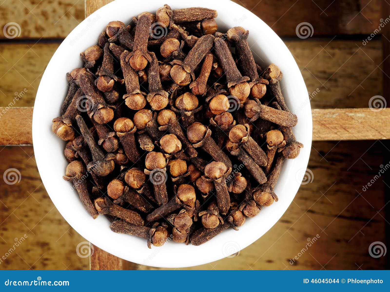 Cloves in white dish stock photo. Image of ingredients 46045044