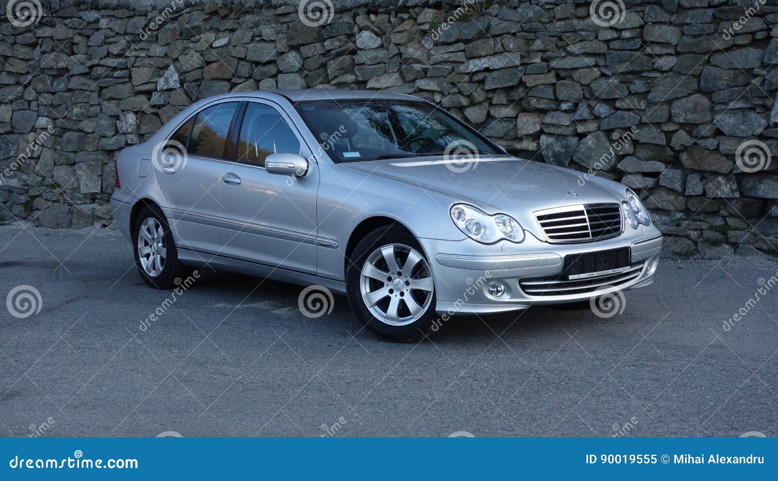 Cluj Napoca/Romania-March 31, 2017: Mercedes Benz W203 - Year 2005,  Avantgarde Equipment, Silver Metallic Paint Near a Rock Wall P Editorial  Image - Image of blue, class: 90019555