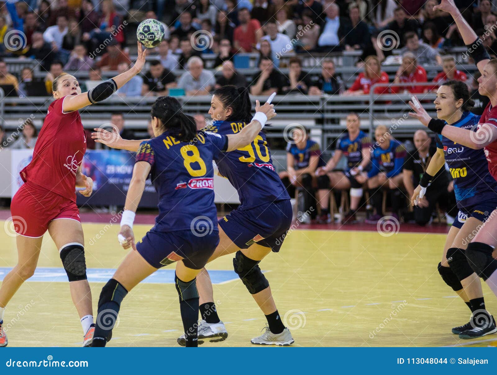 Women playing handball editorial stock image. Image of active - 113048044