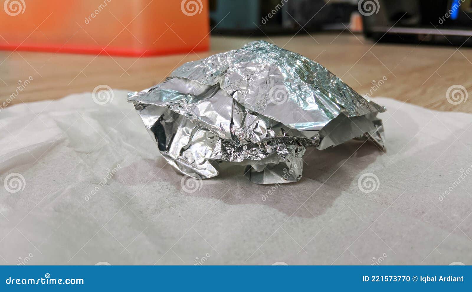 clumps of aluminum foil on the table.