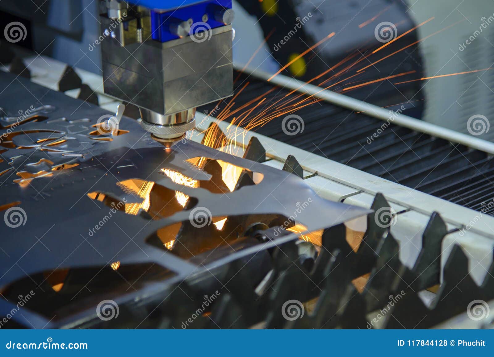 The CNC Laser Cutting Machine Cutting the Metal Plate Stock Photo
