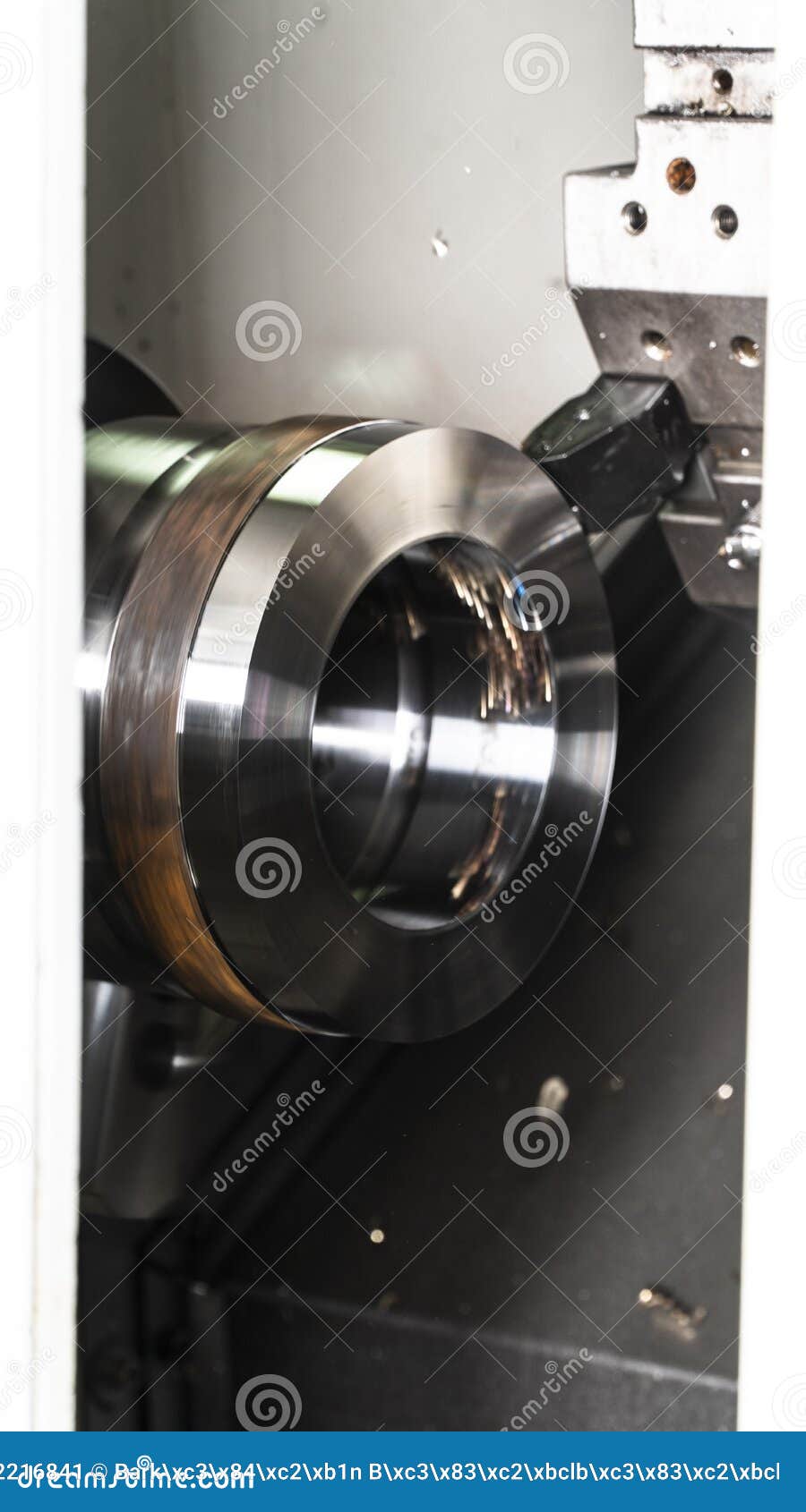 the cnc lathe machine chucking the pin bushing .the turning machine cutting forming cutting the metal shaft