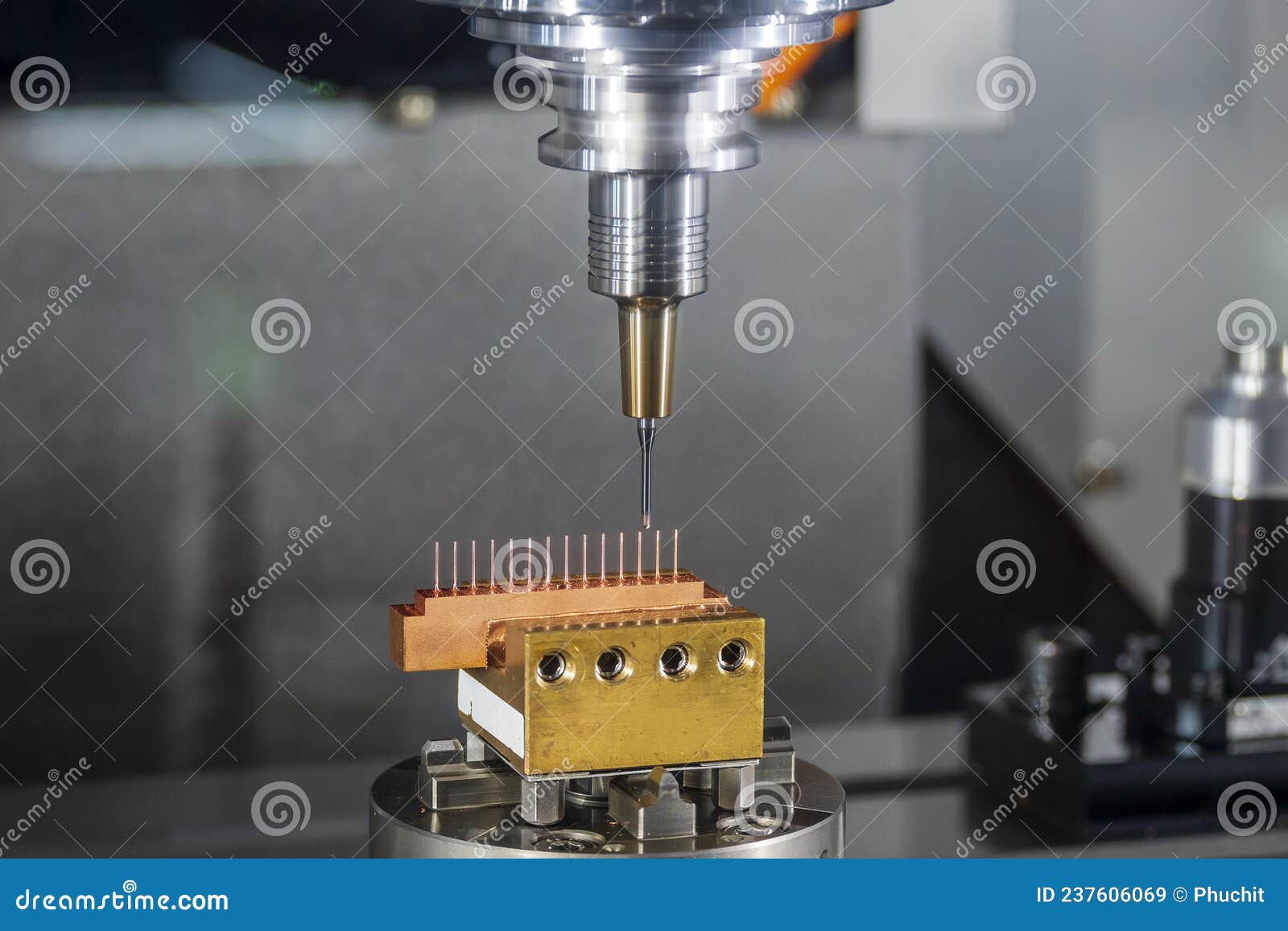 The CNC Milling Machine Cutting the Electrode Parts with Solid Ball End Mill Tools Stock Image