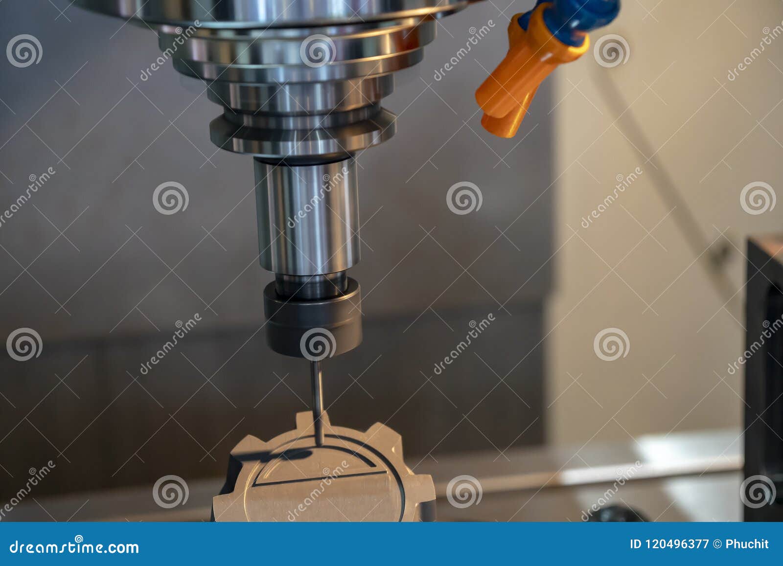 The CNC Milling Machine Cutting the Graphite Electrode Part Stock Image