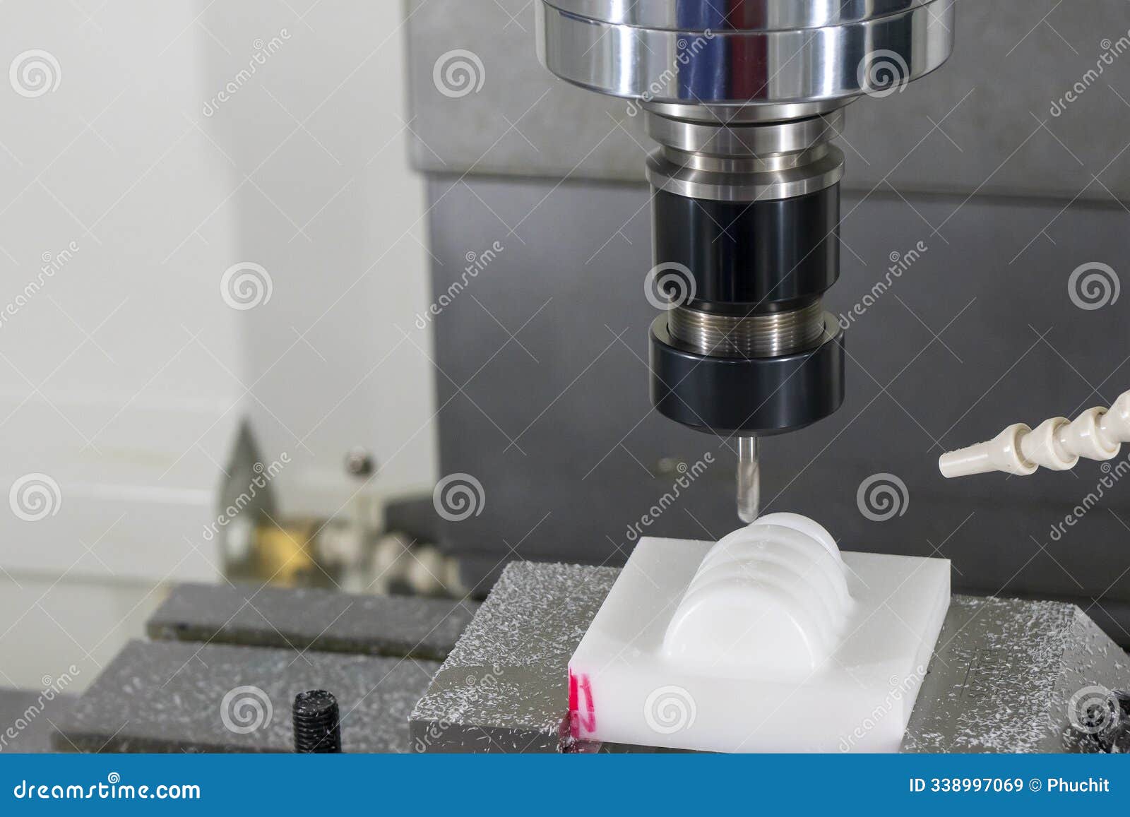 the cnc milling machine cutting the nylon parts with solid ball end mill tool