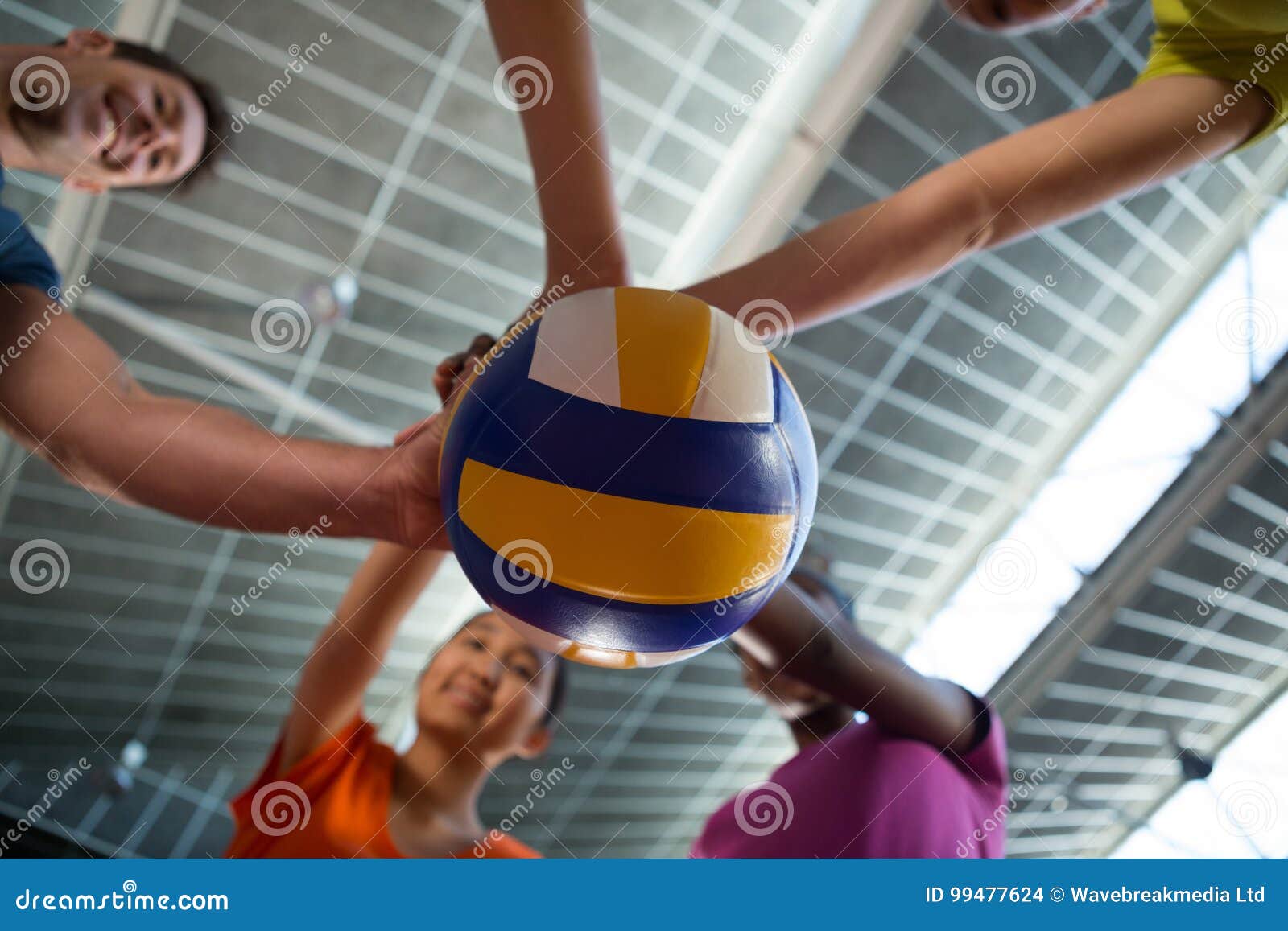 Coach and Female Players Holding Volleyball Stock Photo - Image of ...