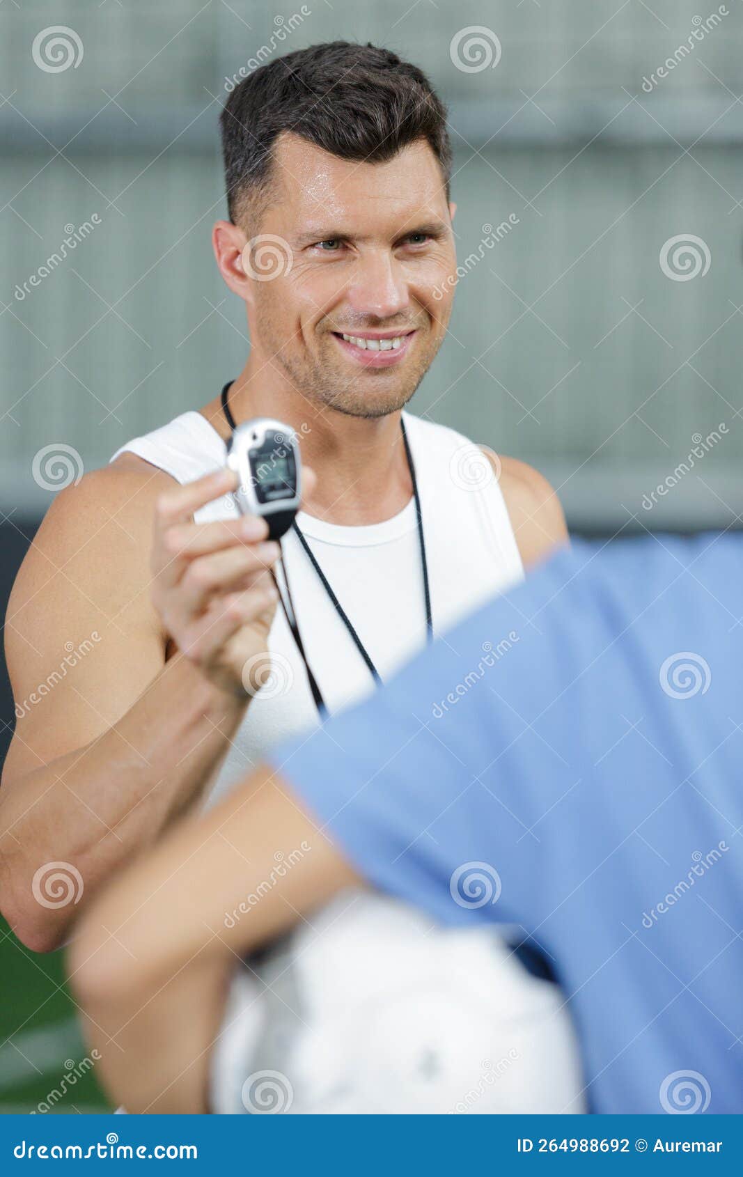 Coach holding stopwatch stock photo. Image of game, competitive 264988692