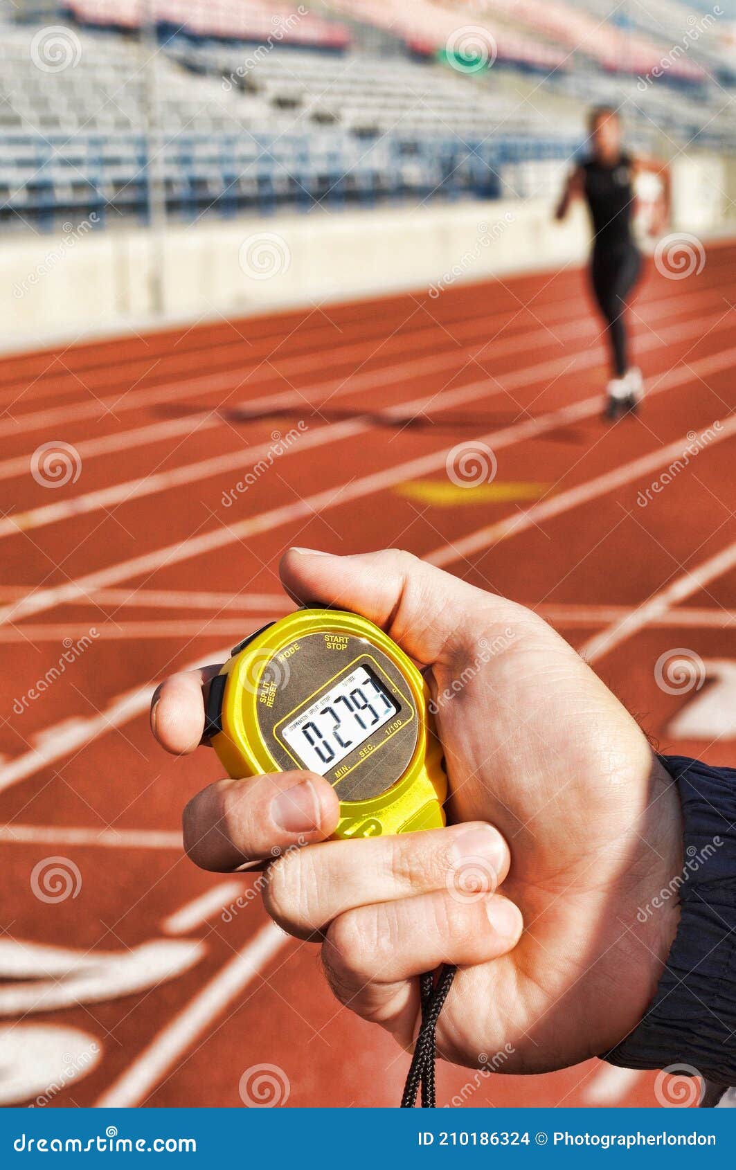Coach Holding Stopwatch Timing Runner Stock Photo Image of adult