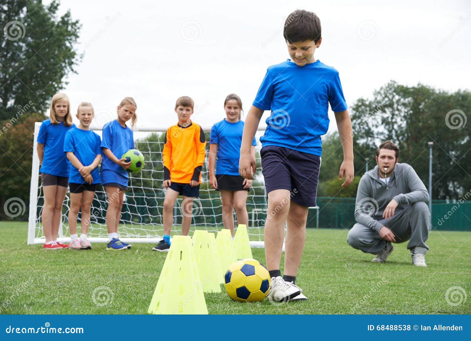 Coach Leading Outdoor Soccer Training Session Stock Photo Image of learning, outdoors 68488538