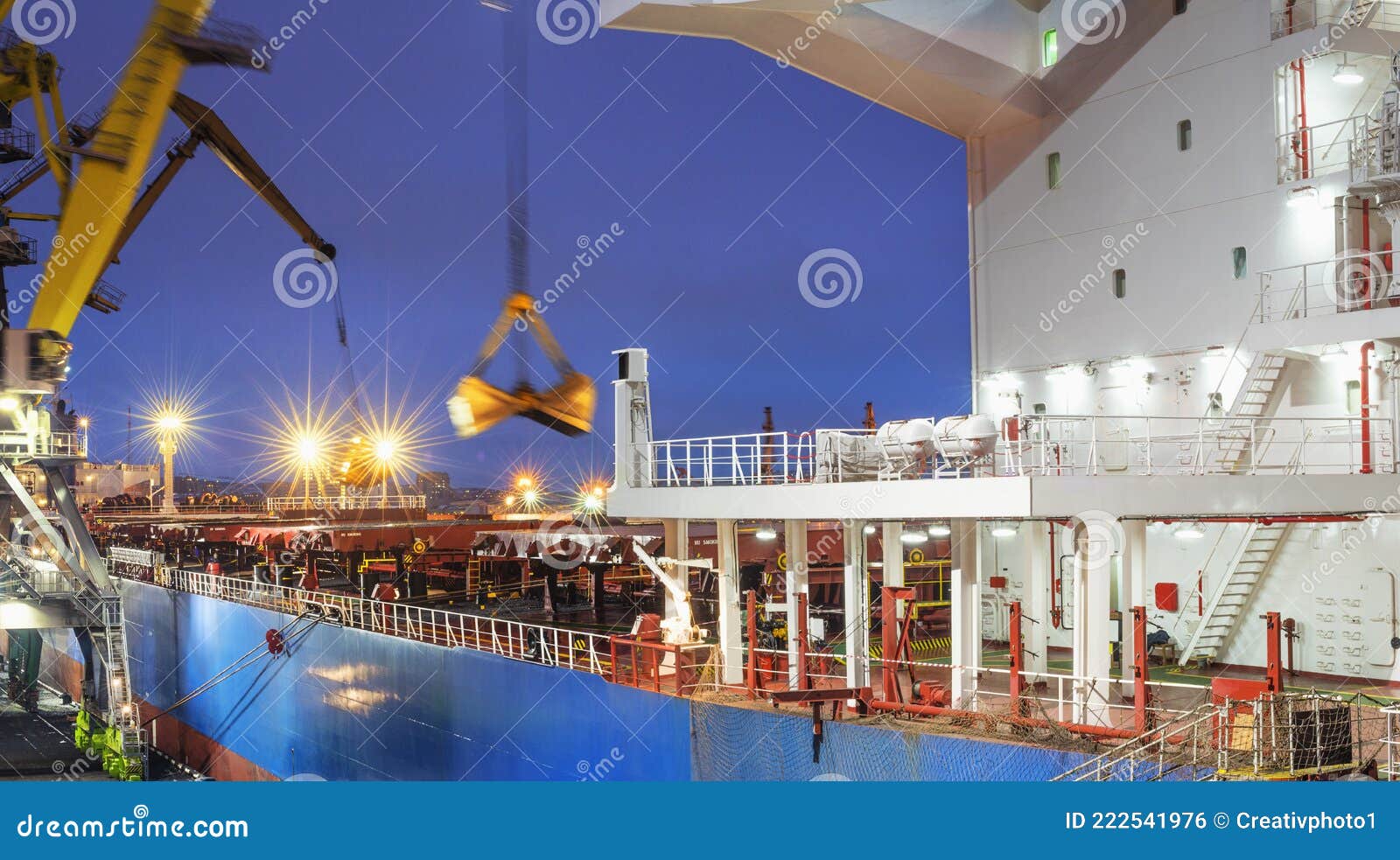 coal-is-loaded-into-the-holds-of-a-dry-cargo-ship-in-the-seaport-24