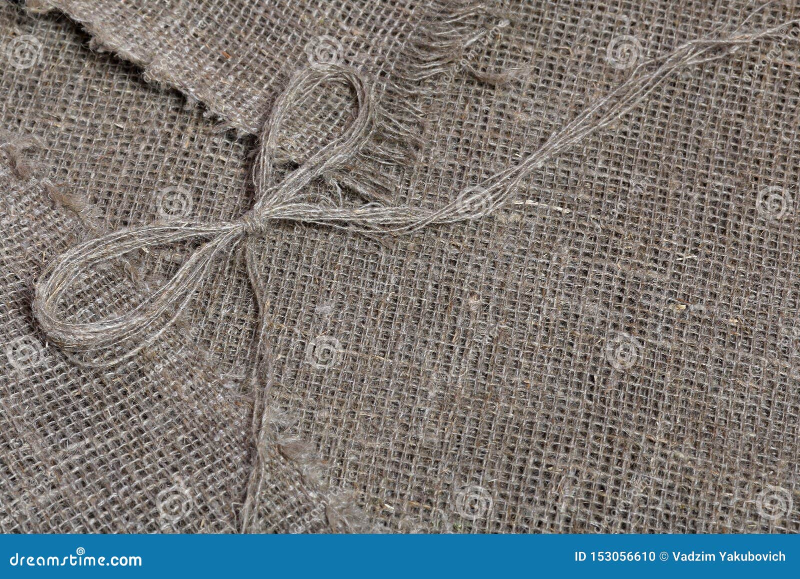 Coarse Linen Fabric. on it Lies a Bow of Linen Thread Stock Photo ...