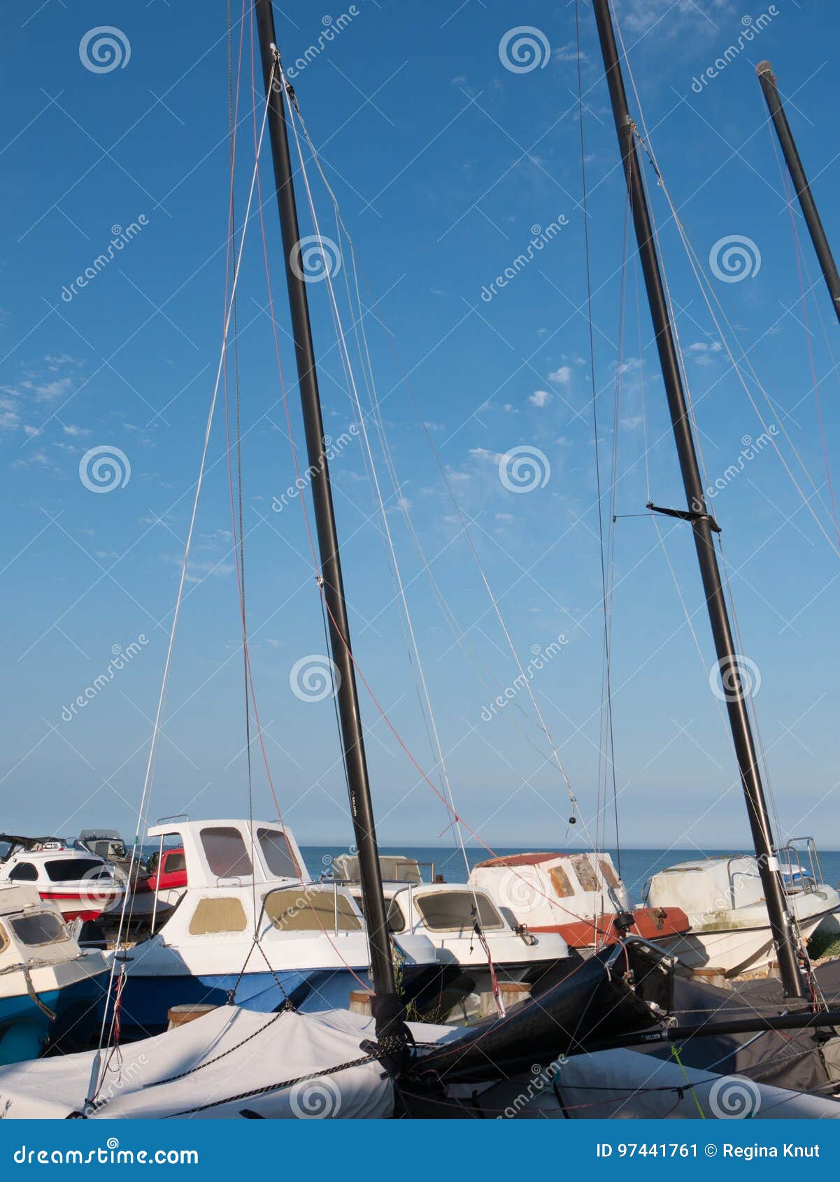at the coast with sailing boats