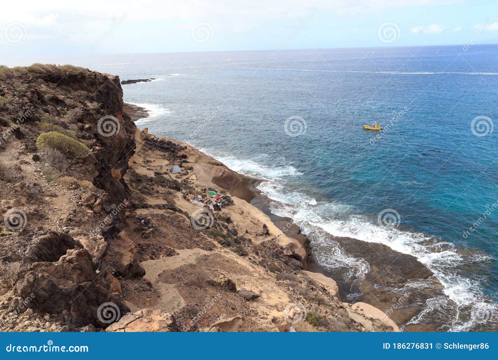 coastline with cliffs at beach playa de los morteros on canary island tenerife, spain
