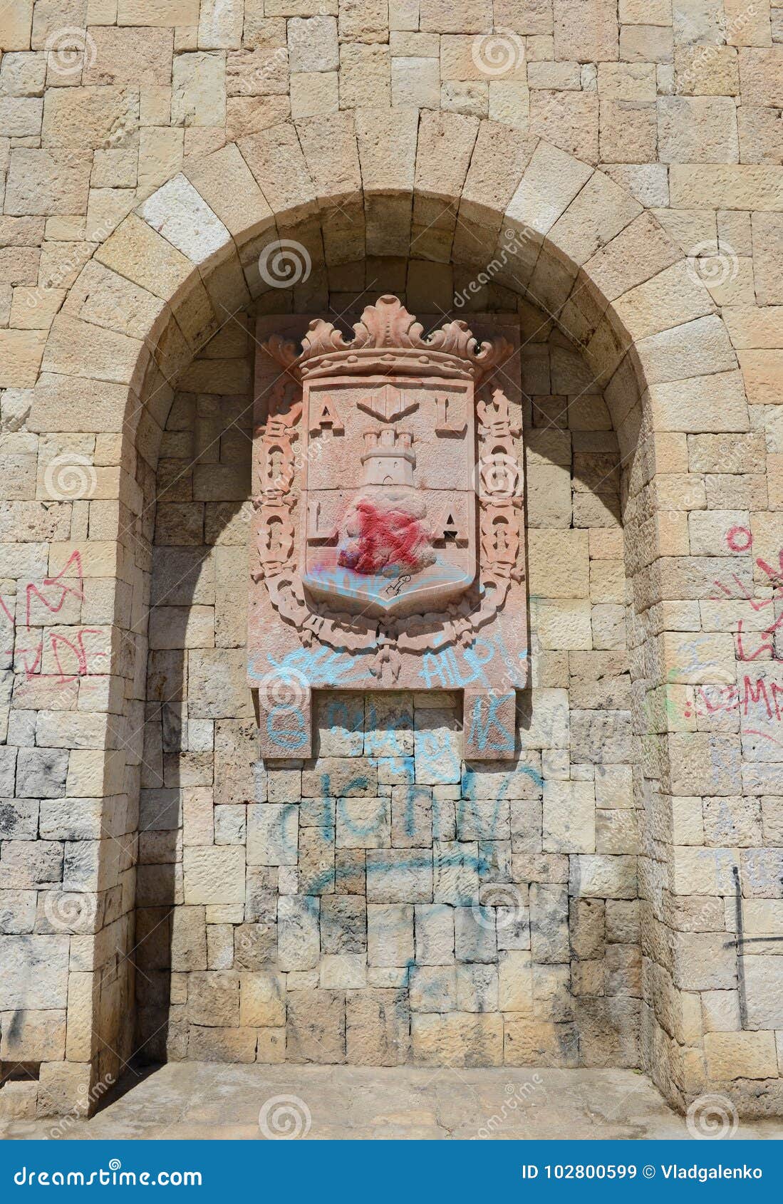 coat of arms alicante on the building of the institute of education george juan.