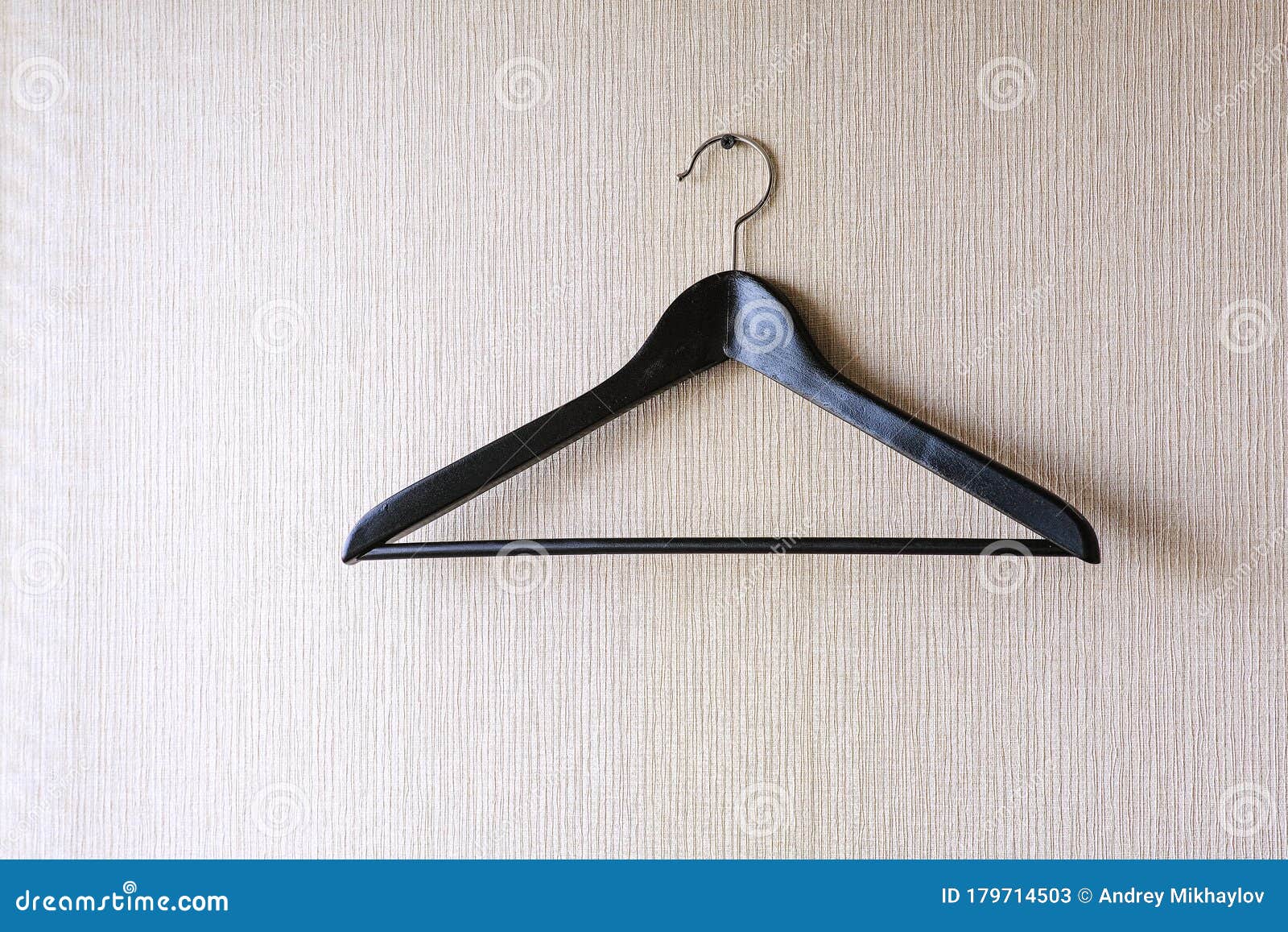 A Coat Hanger Hangs on a Nail Driven into the Wall Stock Image Image