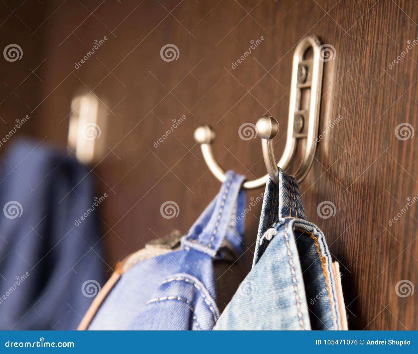 Coat hook in the closet stock photo. Image of jacket 105471076