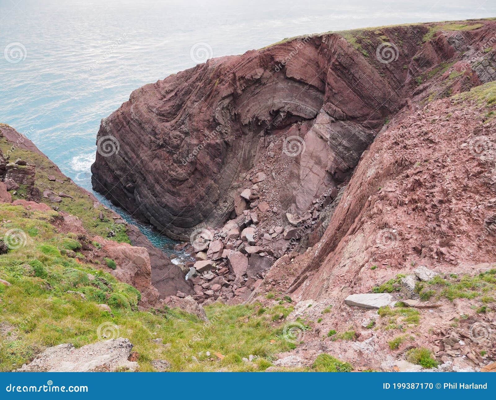 cobblers hole, st anns head, folds in the sandstone rock, pembrokeshire, wales