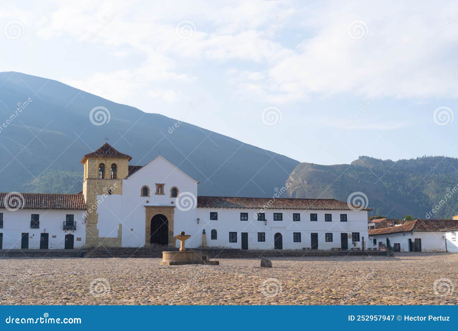 the cobblestone main square of villa de leyva with historical church of villa de leyva and colonial architectures