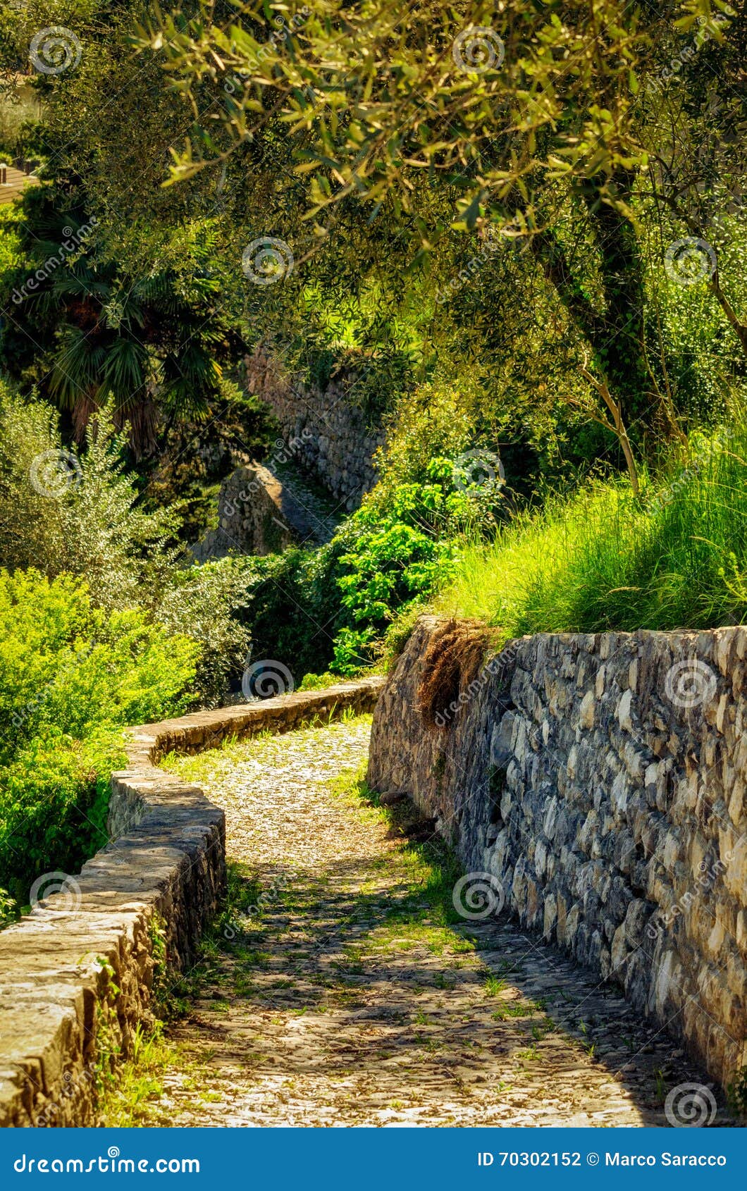 cobblestones track in the greenway path at lago di como