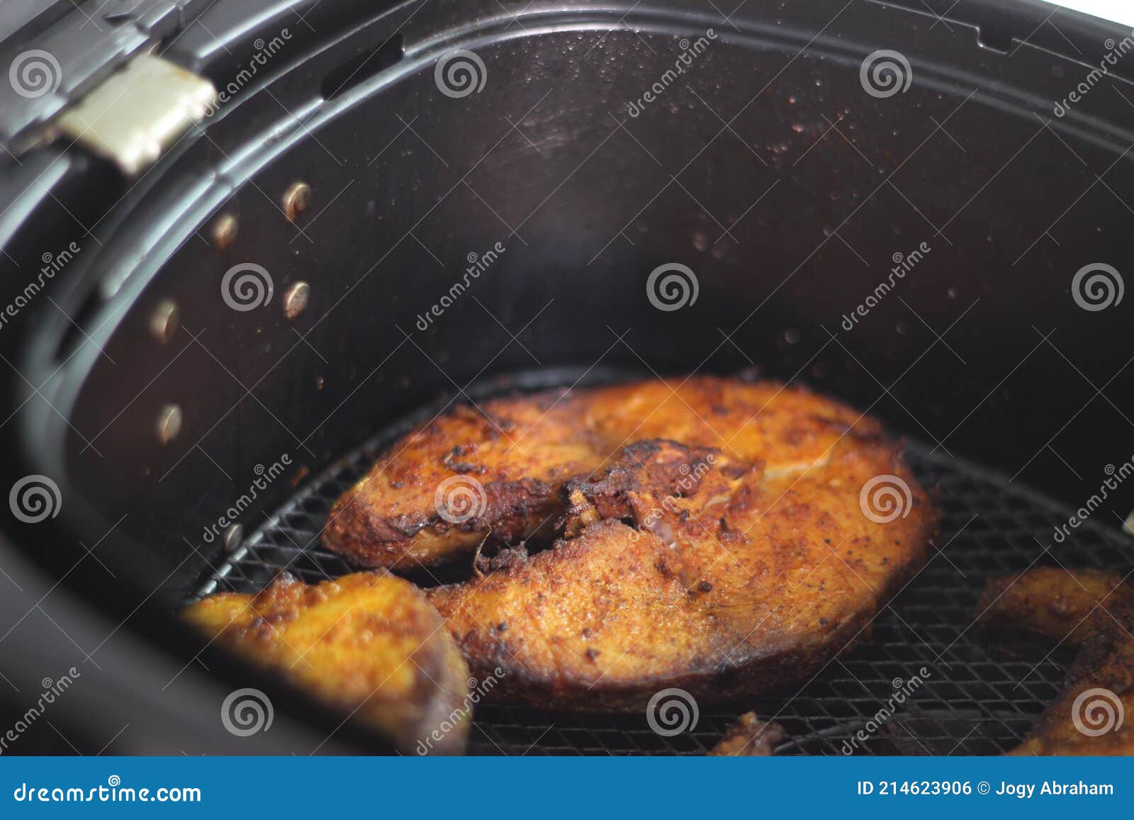 cobia fish inside the air fryer. in india it is called moda fish