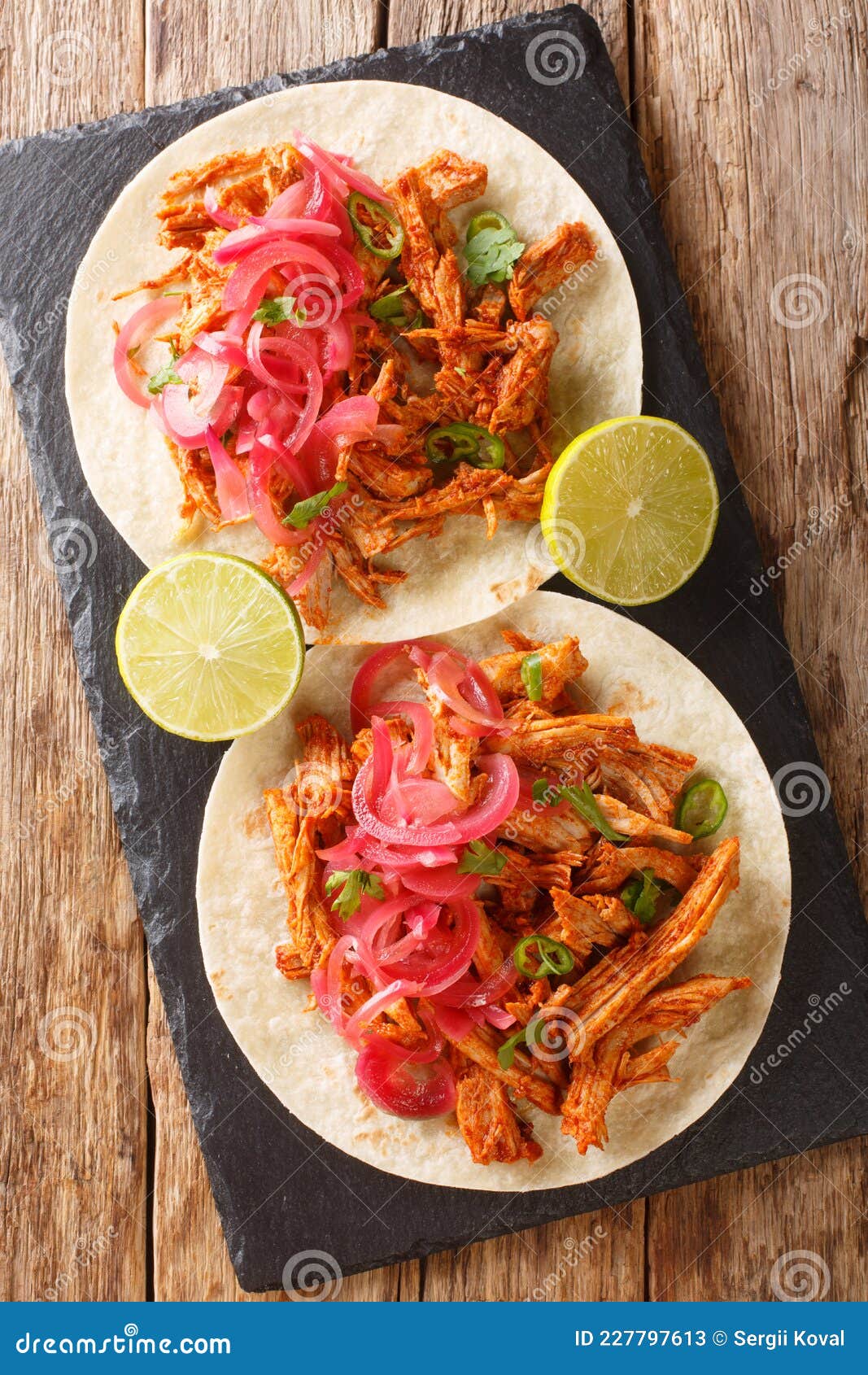 cochinita pibil also puerco pibil or cochinita con achiote is a traditional mexican slow-roasted pork dish from the yucatan