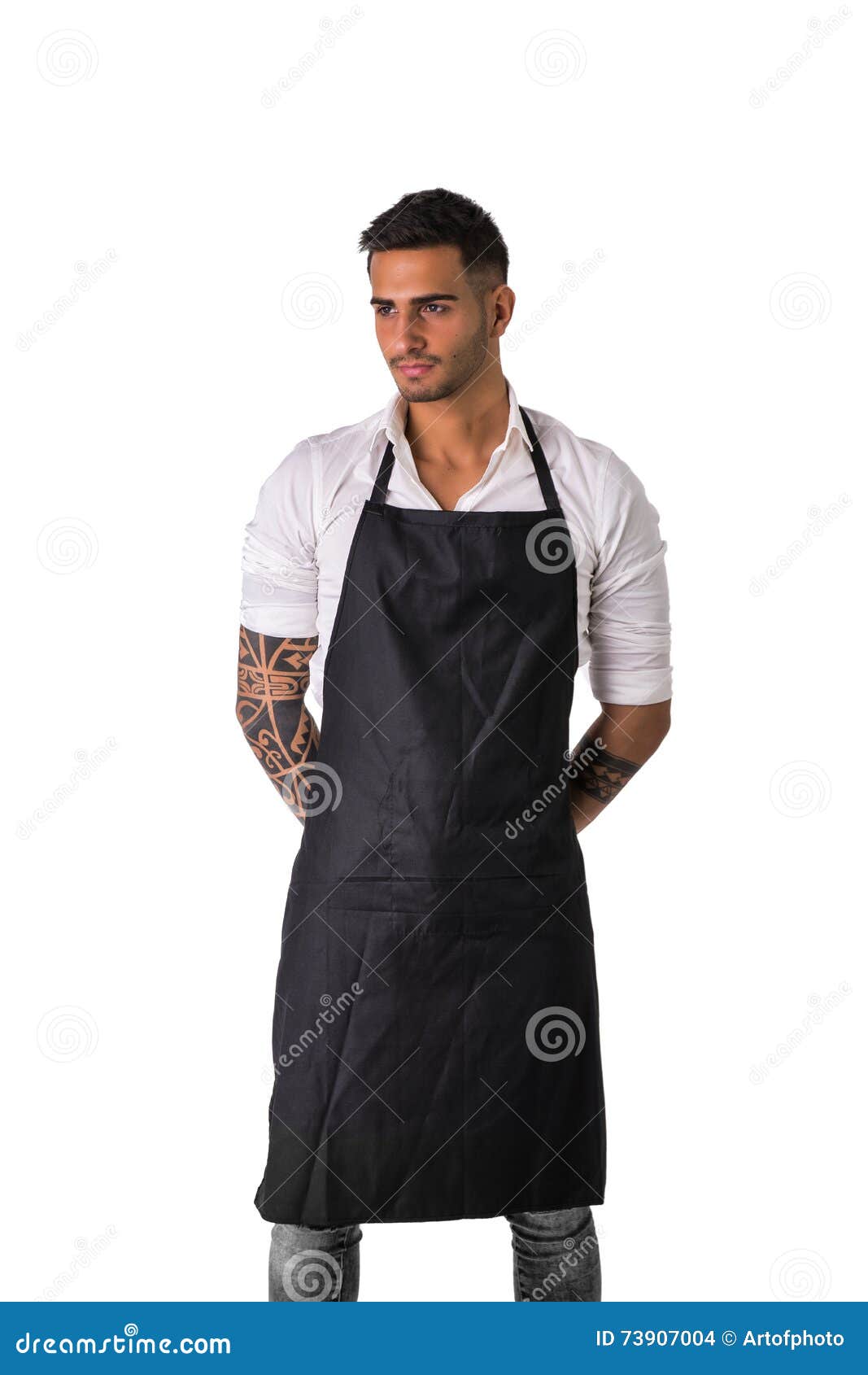 Cocinero O Camarero Joven Que Lleva El Delantal Negro Foto de archivo -  Imagen de abierto, delantal: 73907004