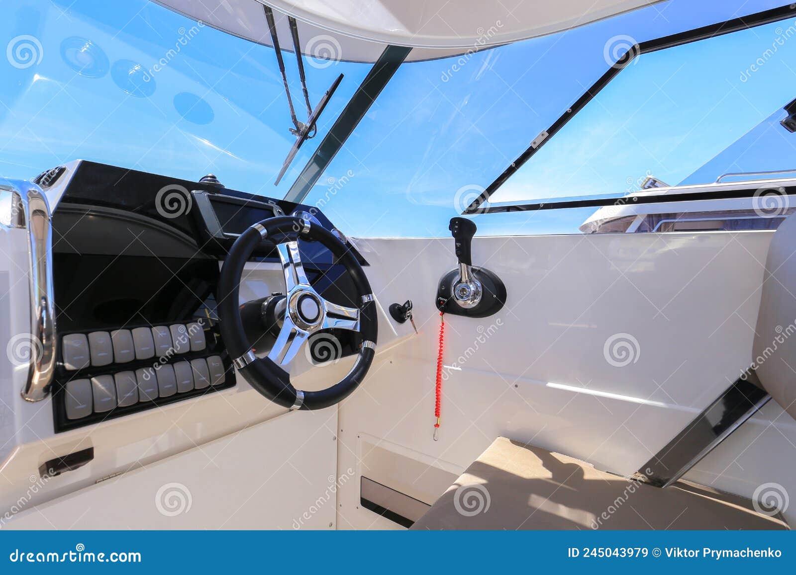 Cockpit Motor Boat with Steering Wheel and Throttle Control Stock Image