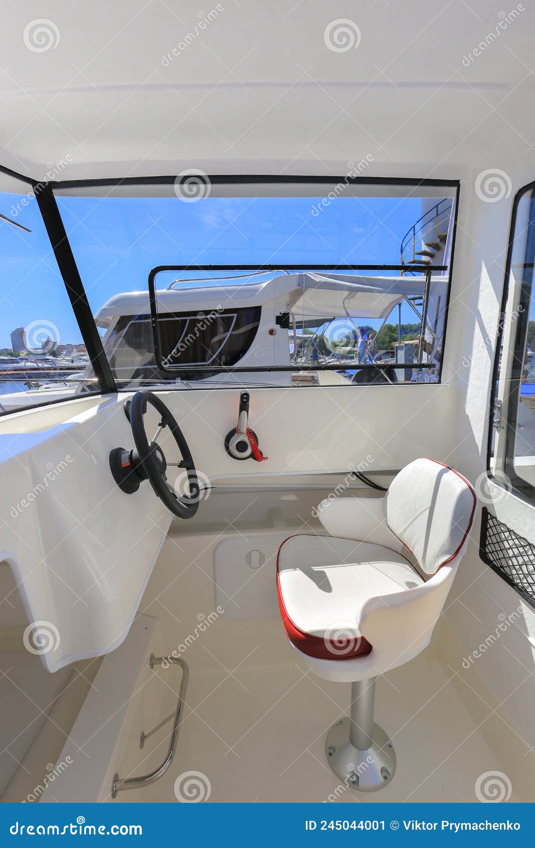 Cockpit Motor Boat with Steering Wheel and Throttle Control Stock Image