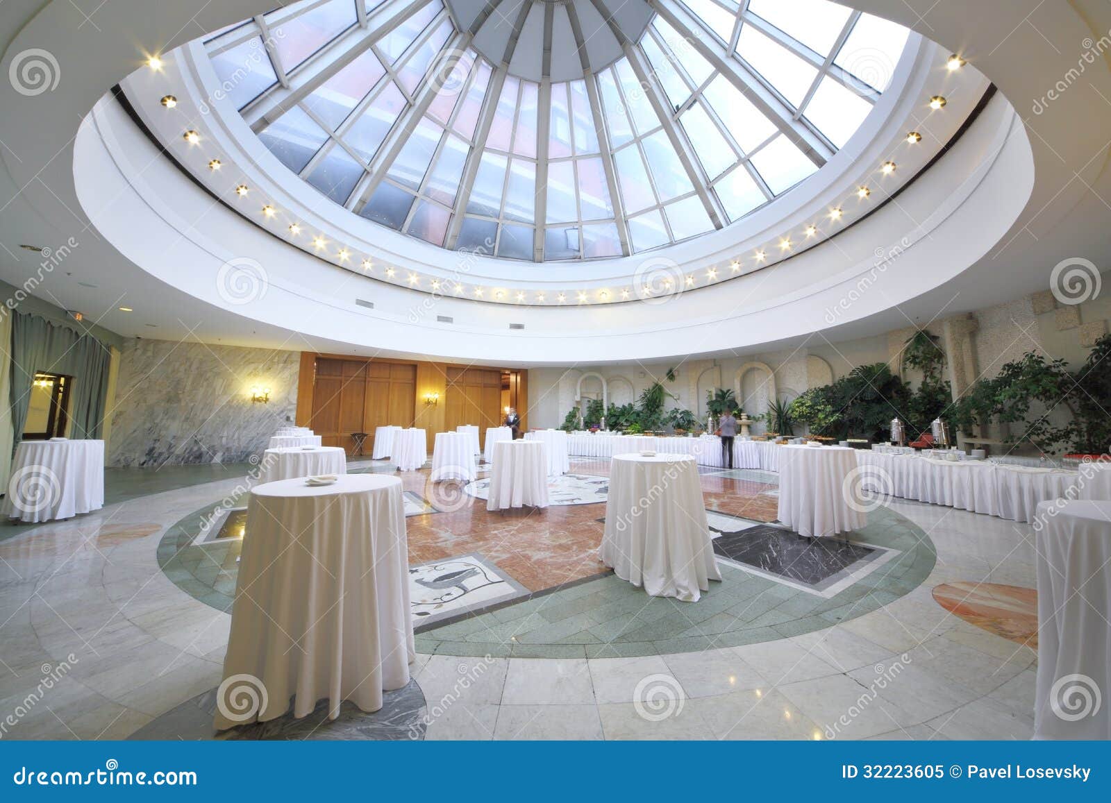 MOSCOW - NOV 21: Cocktail reception at the White Hall with glassy ceiling in the President Hotel, on Nov 21, 2012 in Moscow, Russia