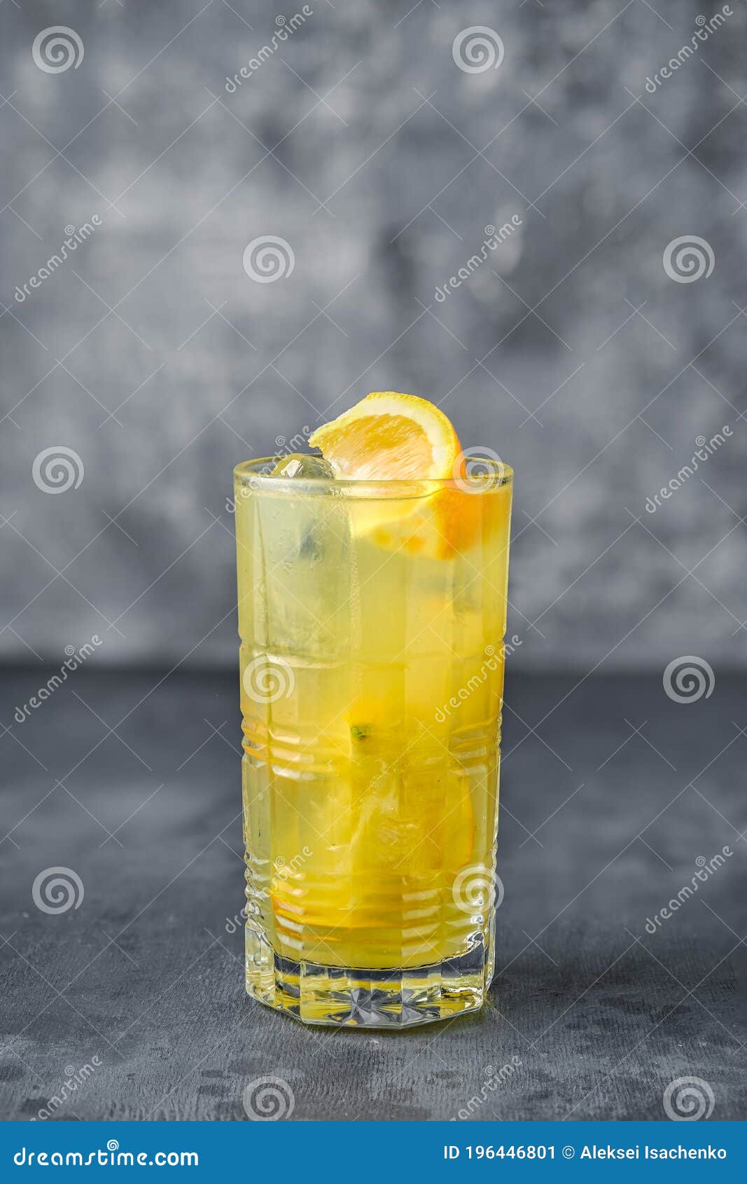 Cocktail with Rum and Orange Juice on Gray Background Stock Image