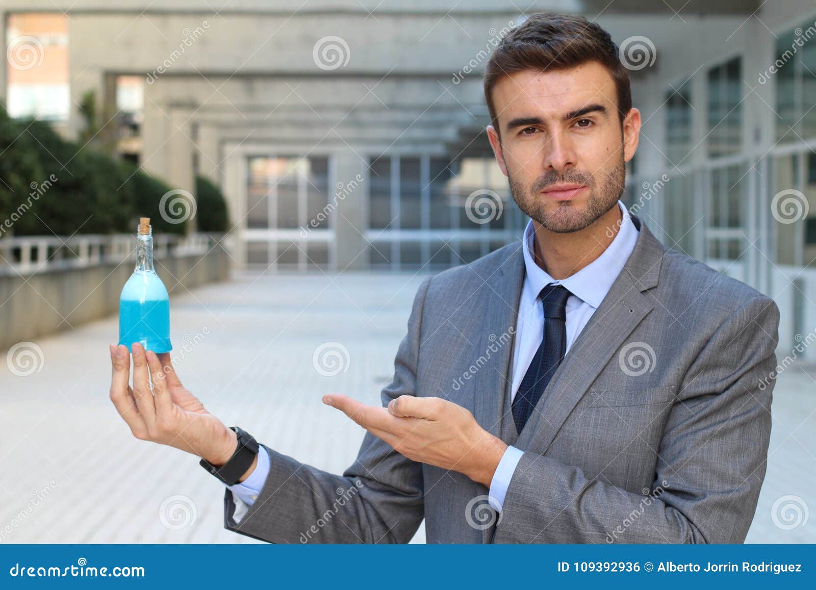 cocky businessman holding a potion