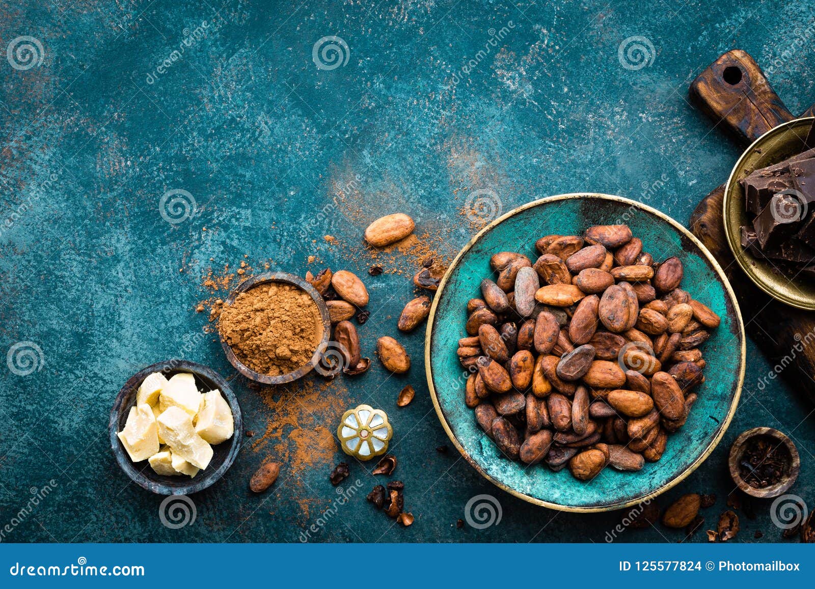 cocoa. cocoa beans, dark bitter chocolate chunks, cacao butter and cocoa powder