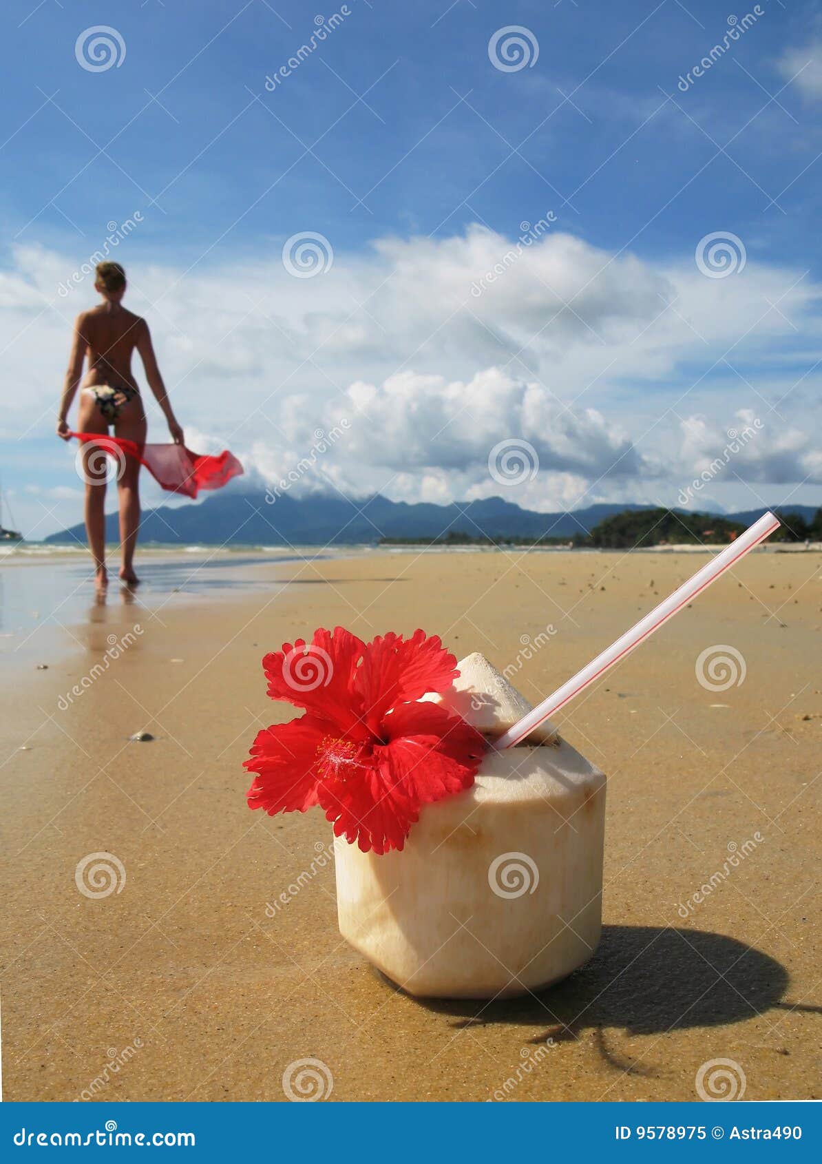 Fast Food Containers and Drink Cups on the Beach with Towels and