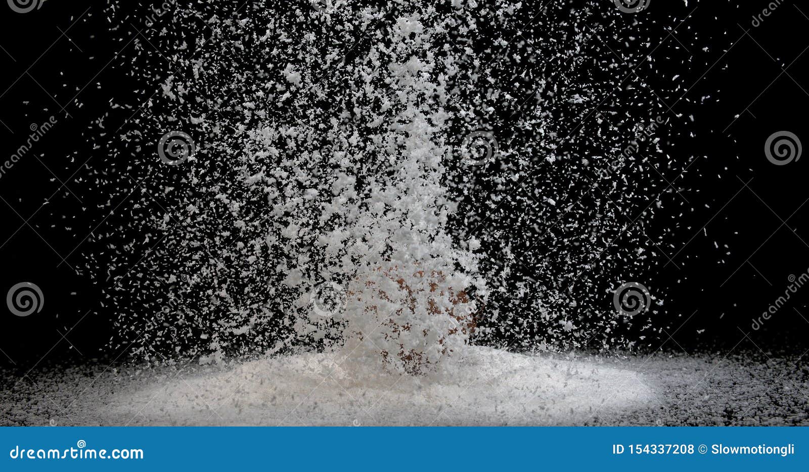 Coconut, Cocos Nucifera, Fruit and Powder Exploding Against Black