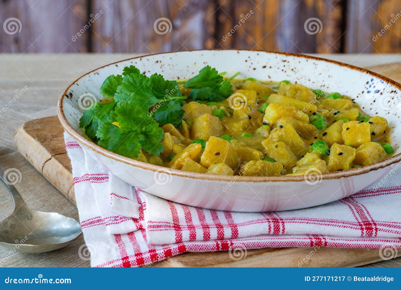Coconut and potato curry stock image. Image of traditional - 277171217