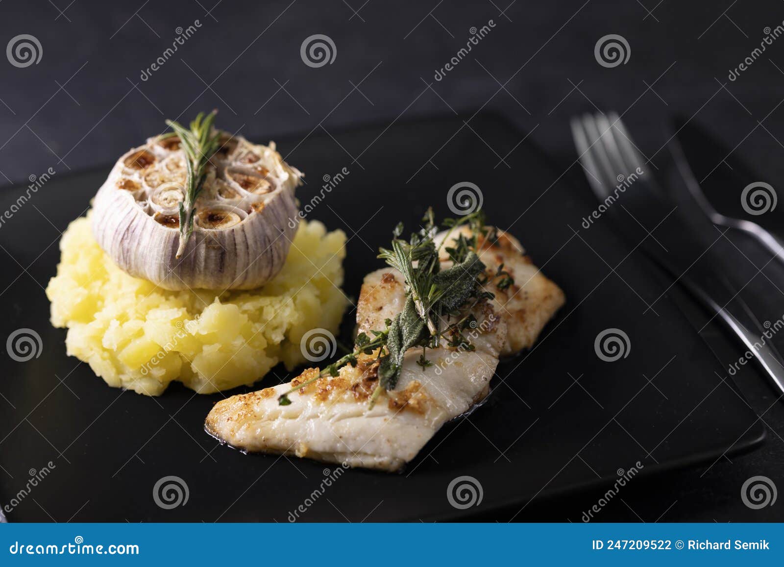 Cod Fillet with Couscous and Roasted Garlic Stock Photo Image of food
