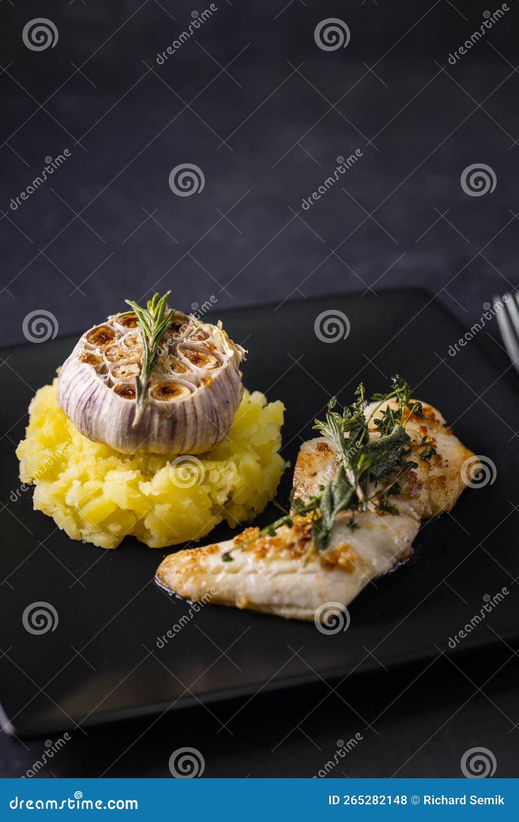Cod Fillet with Couscous and Roasted Garlic Stock Photo Image of