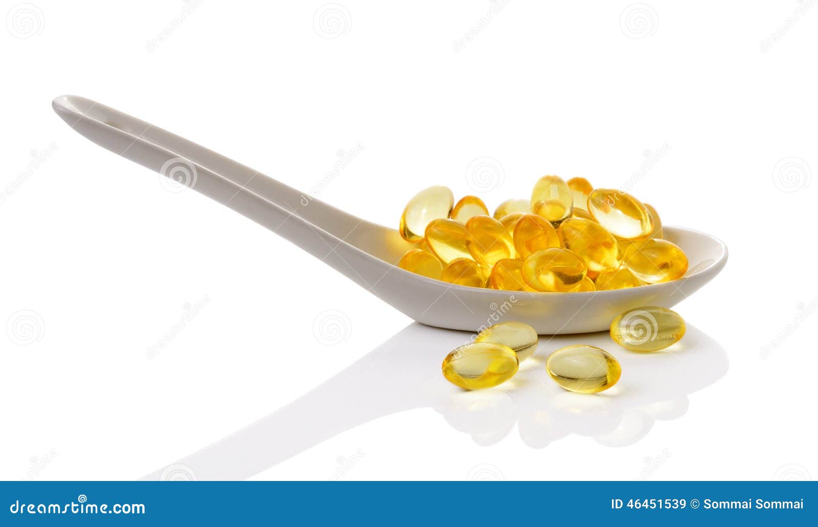 cod liver oil omega 3 gel capsules in spoon